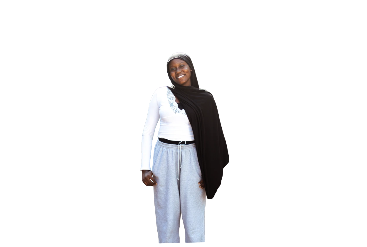 Coumba Aw standing confidently in Sédhiou, Senegal
